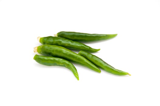 green chili on white background