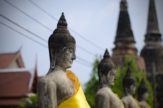 Ancient Buddha statues at Wat Yai Chai Mongkol in Ayutthaya, Thailand 