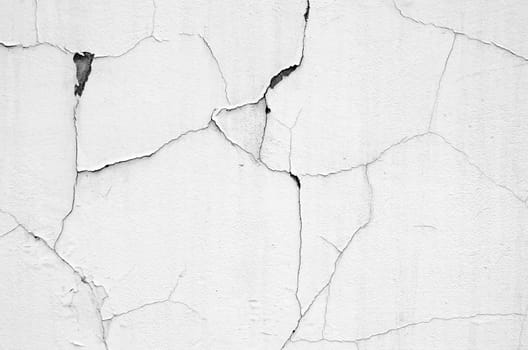 white wall with cracks