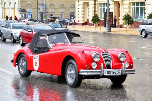MOSCOW, RUSSIA - JUNE 3: English motor car Jaguar XK150 competes at the annual L.U.C. Chopard Classic Weekend Rally on June 3, 2012 in Moscow, Russia.