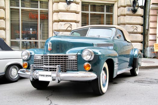 MOSCOW, RUSSIA - JUNE 3: American motor car Cadillac Series 62 competes at the annual L.U.C. Chopard Classic Weekend Rally on June 3, 2012 in Moscow, Russia.