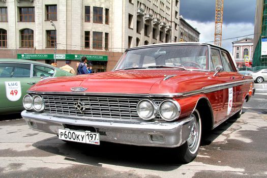 MOSCOW, RUSSIA - JUNE 3: American motor car Ford Galaxie competes at the annual L.U.C. Chopard Classic Weekend Rally on June 3, 2012 in Moscow, Russia.