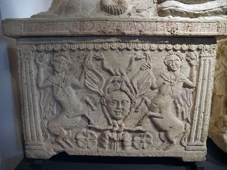 Etruscan gravestones . Alabaster cinerary urns from Montepulciano ,Poggio alla sala. 3-2 centuries B.C. On the coffin , a Gordon mask between two centaurs.