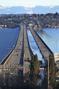I-90 Bridge Seattle Mercer Island Highway Cars Snowy Cascade Mountains Bellevue Washington State Pacific Northwest