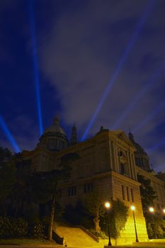 "Night image of the Palace of Montjuic in Barcelona, illuminated by a special light"