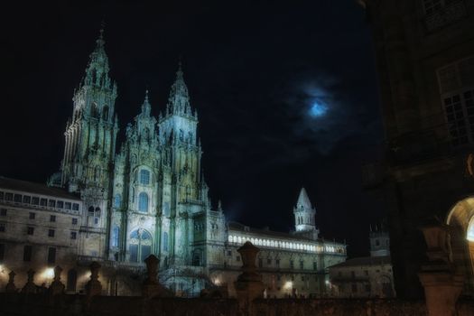 "Moon magic illuminates the facade of the cathedral of Compostela Santiago"