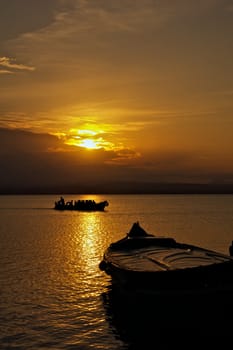 "The last trip of tourists back to the pier at the end of the day"