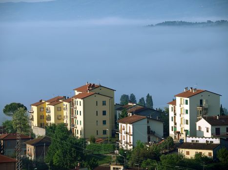 Fabulous landscape of the foggy morning in Tuscany. The valley between Montepulciano and Chiusi