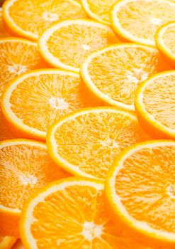 Abstract background with fresh juicy orange slices