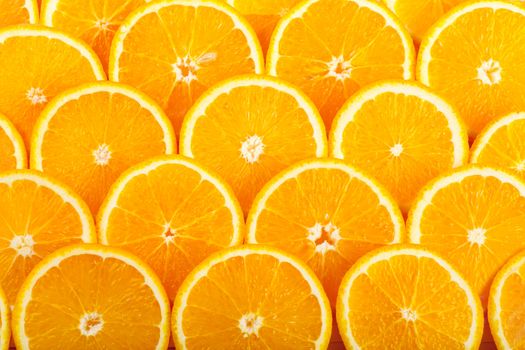 Abstract background with fresh juicy orange slices