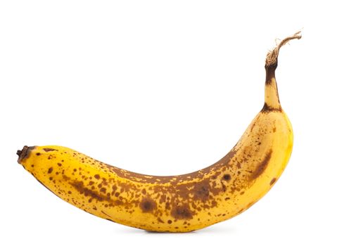 Single overripe banana isolated over white background