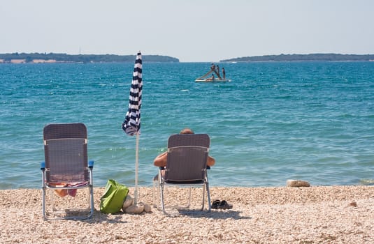 Man resting on the beach