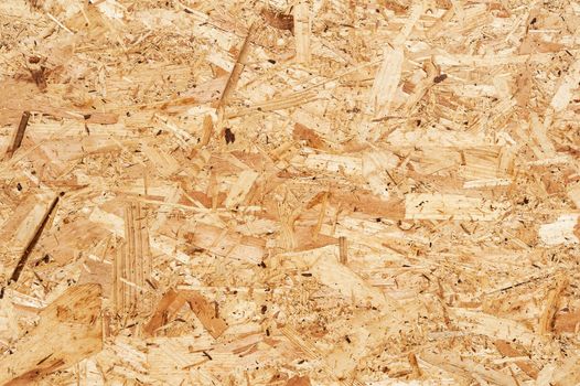 Close up of a recycled compressed wood chippings board