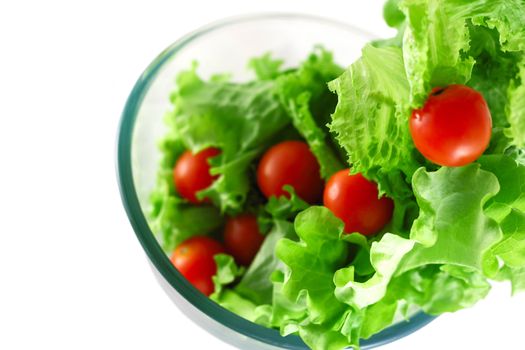  Light lettuce and cherry tomatoes salad top view isolated on white lightness concept
