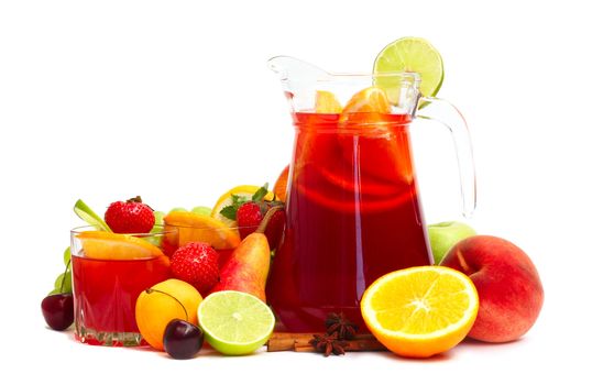 Refreshing fruit sangria in jug with different fruits solated on white