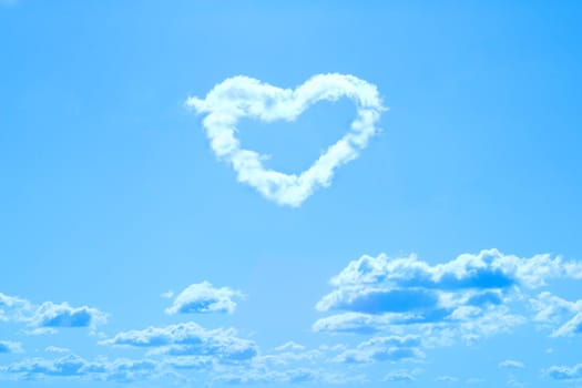 cloud shaped like heart on blue sky