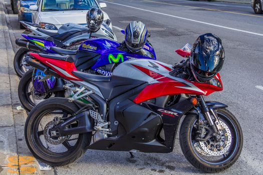 Three amazing and clean Honda CBR 600 parked near the road, Quebec, Canada