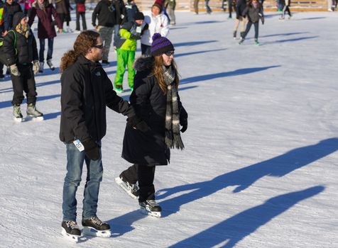  Ice skaters in a Skating Rink in Old Port of Montreal, Quebec, Canada