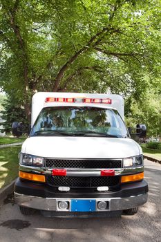 Ambulance on street in residential urban area