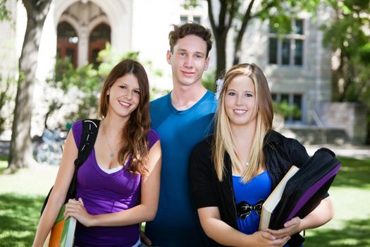 Group portrait of three college students