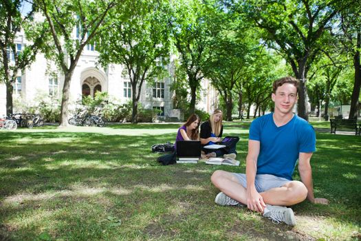 Group of students studying at college campus