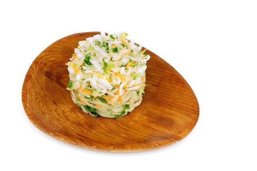 Salad of Sauerkraut with Spring Onion, Dill and Carrot on Wooden Plate isolated on white background