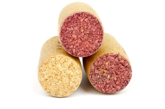 Arrangement of Three New and Old Wine Corks isolated on white background