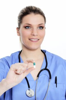 woman doctor with pill in the hand