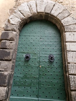 Old wooden door in Tuscany