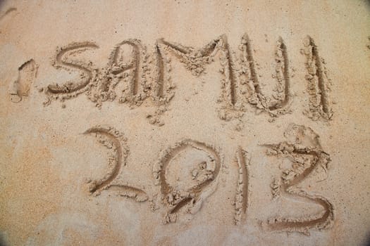 Hand written text on samui beach