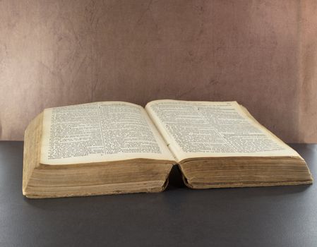 old bible book with brown background