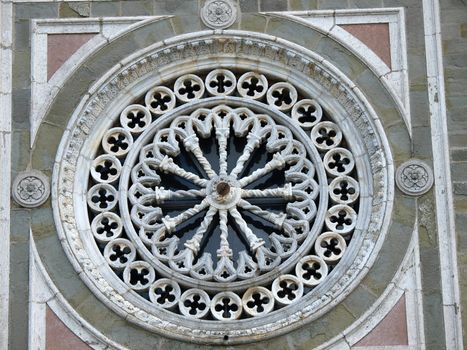 Rose window on the facade of the church of St. Margaret of Cortona