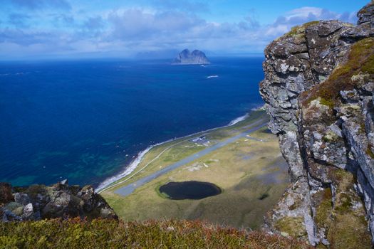 Scenic view of Lofoten islands in Norway from the top of cliffs on Vaeroy