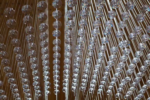 abstract strings and crystals arranged in geometric pattern
