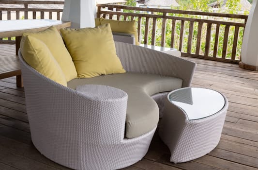 wicker sofa with cushions on the porch tropical hotel