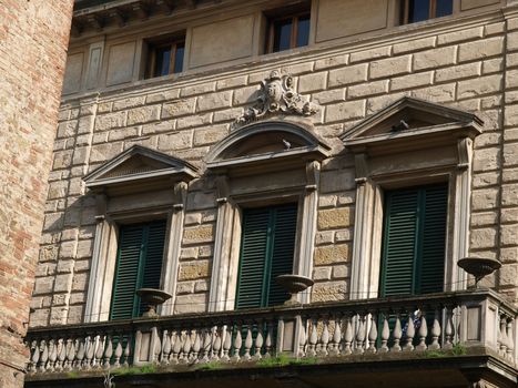 The facade of one of the buildings on the main street in Montepulciano