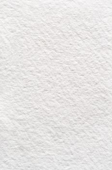 A rough texture background of absorbent white watercolour (watercolor) paper.