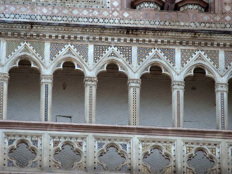 Detail of the facade of Orvieto Cathedral. (1290 - 1600 a. c.) Richly decorated with lots of stone mosaics 