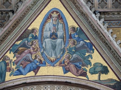 Orvieto - Duomo facade. The mosaic depicts the Assumption of Mary, designed by Giovanni di Buccio Leonardelli in 1366.
