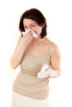 sneezing and laughing allergies ill woman with tissues