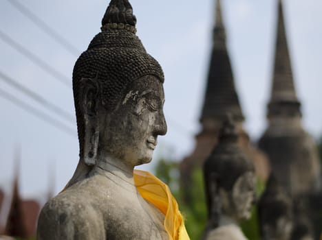 Cracked surface of old Buddha statue, decline of Buddhism concept 