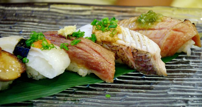 Sushi set on glass dish, Japanese cuisine
