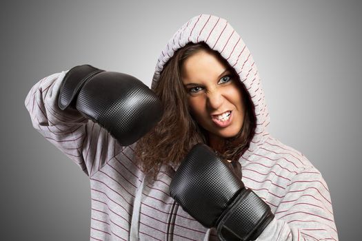 Portrait of a woman with boxing gloves