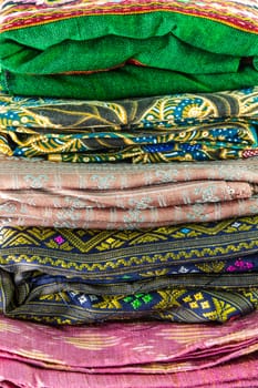 Stack of colorful thai silk