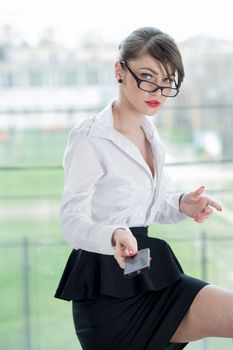 beautiful businesswoman with phone and laptop