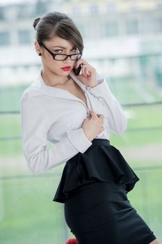 beautiful bussines woman with laptop and phone