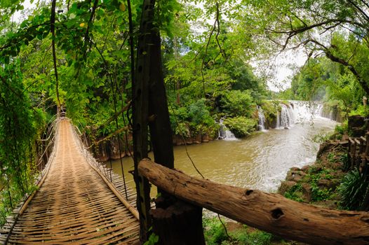 The bamboo rope bridge in Tad Pha Souam waterfall Bajeng national park, Paksa South Laos. 