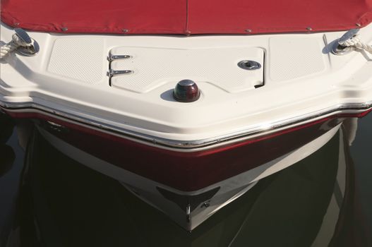 Detail of a red and white boat prow