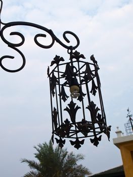 Antique bronze lantern in nature