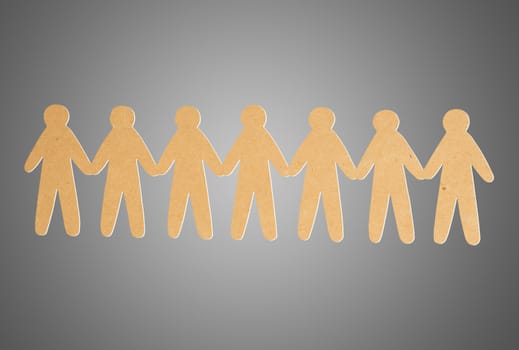 team of paper people on grey background